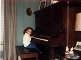 The smaller the girl, the bigger the piano